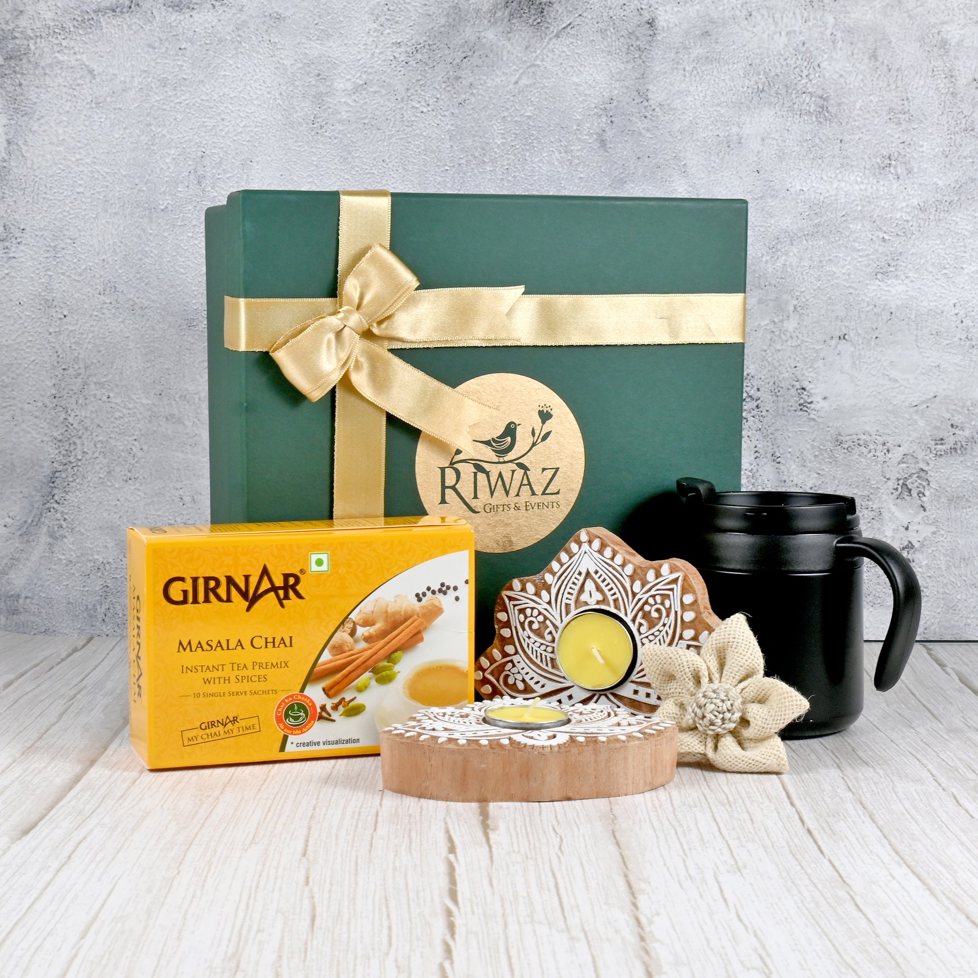 Riwaz Celebration Premium Tea Gift Hamper | Masala Chai, Black Ceramic Mug with Lid, Hand-Painted Tealight Holder & Decorative Flower | Elegant Gift Box for Tea Lovers – Perfect for Diwali, Birthdays & Special Occasions