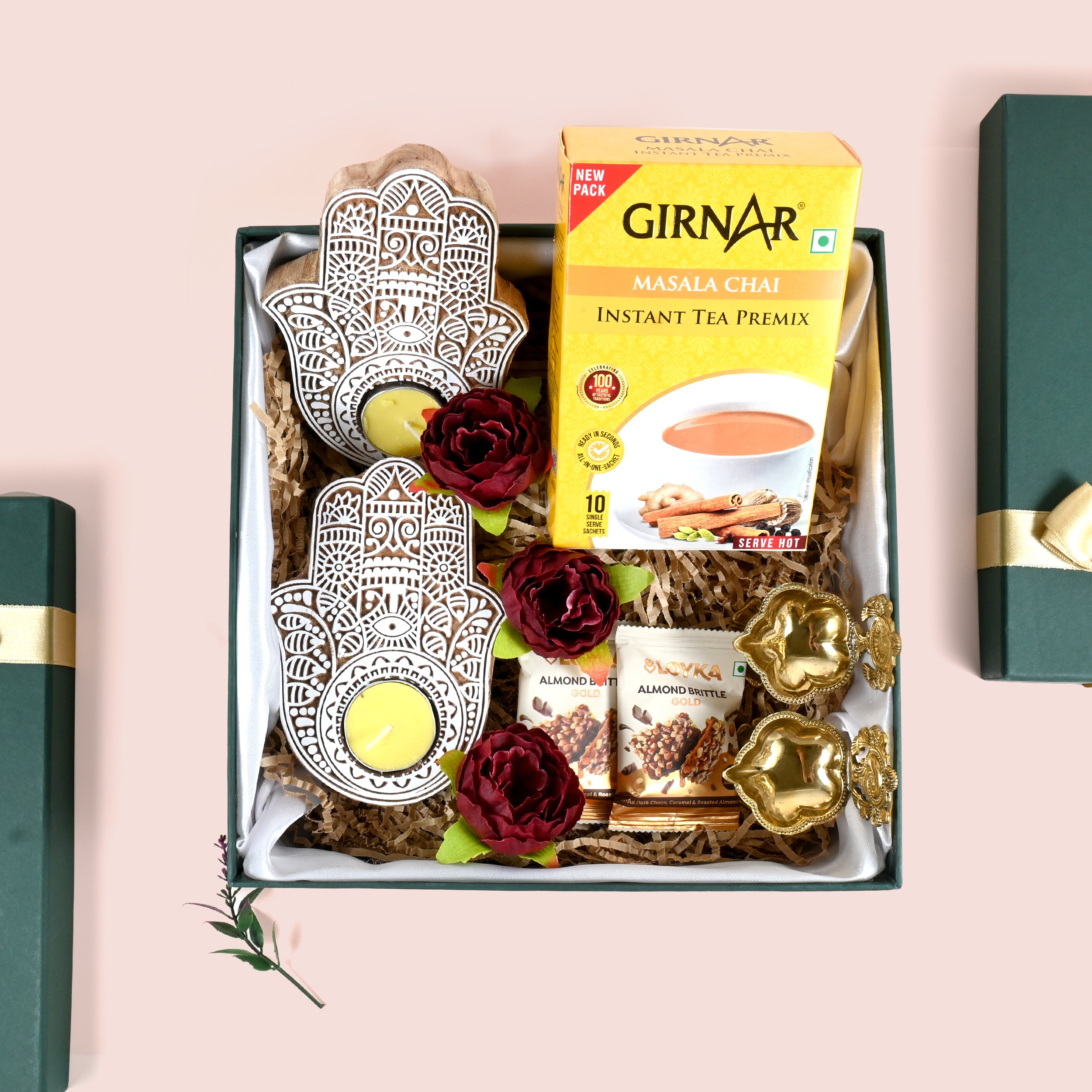 Riwaz Celebration Luxury Festive Gift Hamper | Instant Tea Premix, Almond Brittle, Brass Shankh Chakra Diya, Tealight Holders & Rose Decor |
