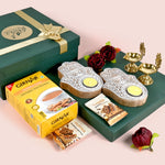 Riwaz Celebration Luxury Festive Gift Hamper | Instant Tea Premix, Almond Brittle, Brass Shankh Chakra Diya, Tealight Holders & Rose Decor |